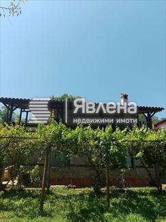 къща